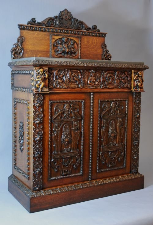 fig 1. Oak cabinet with Renaissance carved panels
