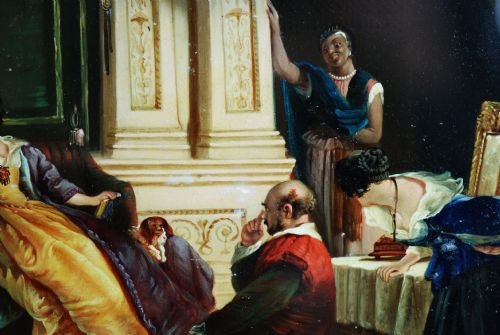fig 2. An antique rectangular papier-mache plaque featuring a hand-painted interior genre scene with figures dressed in historic costume.