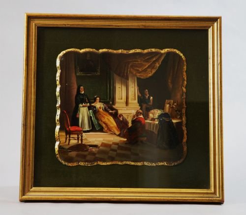 fig 1. An antique rectangular papier-mache plaque featuring a hand-painted interior genre scene with figures dressed in historic costume.