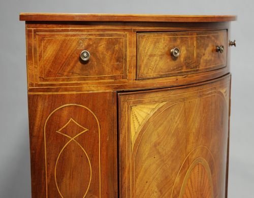fig 1. Mahogany inlaid bow-fronted corner cupboard