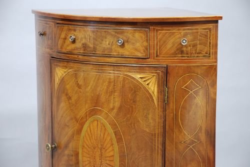 fig 2. Mahogany inlaid bow-fronted corner cupboard