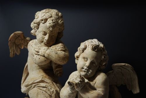 Pair of Mid 17thc Limewood Winged Cherubs