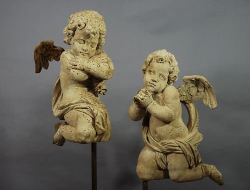 fig 1. Pair of mid 17thc limewood winged cherubs