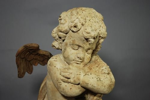 fig 2. Pair of mid 17thc limewood winged cherubs