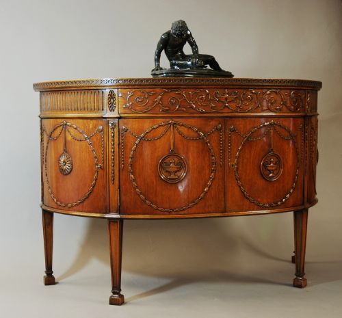 fig 2. Mahogany commode in the Classical style, influenced by Robert Adam