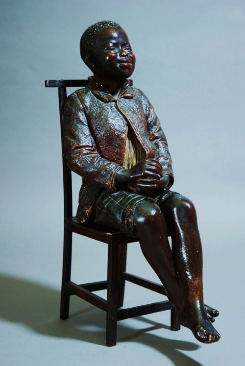 Terracotta Blackamoor Figure in Correction Chair