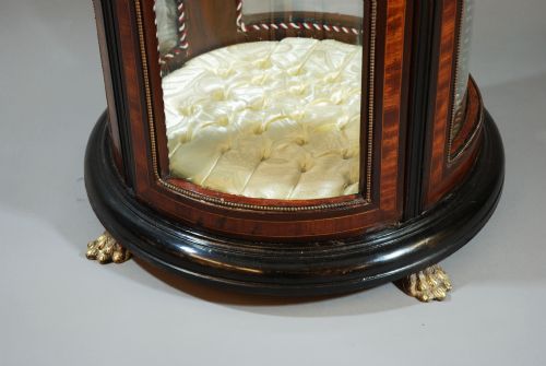 fig 3. Glazed cylinder shaped display case 