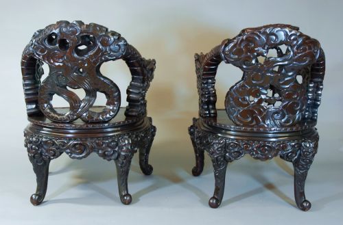 fig 2. Pair of heavily carved Chinese dragon armchairs