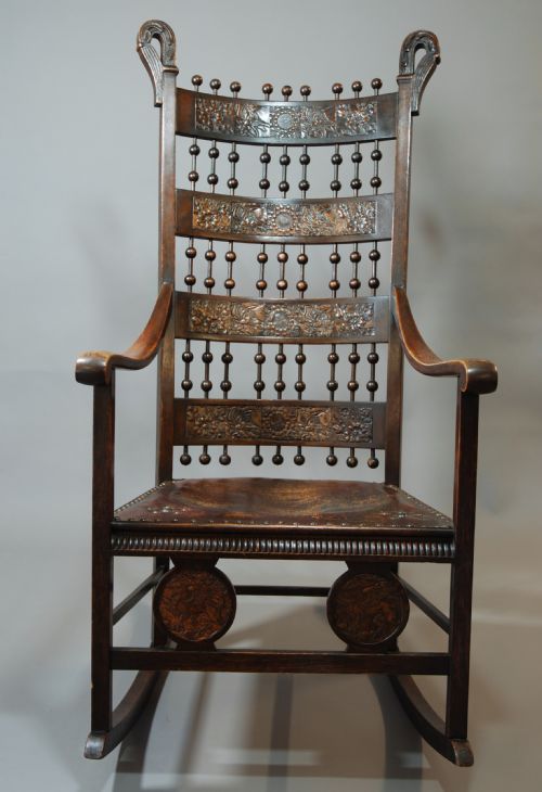 fig 1. Arts & Crafts oak rocking chair of large proportion