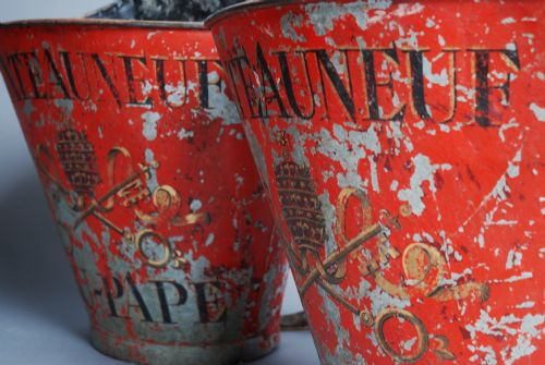 A Decorative Pair of Painted Metal Grape Carriers
