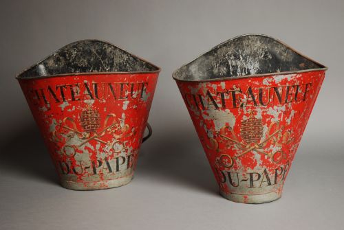 fig 1. A decorative pair of painted metal grape carriers