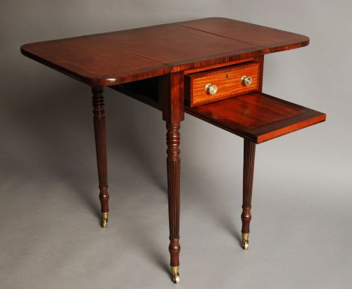 fig 1. Early 19th century satinwood drop leaf table of small proportions
