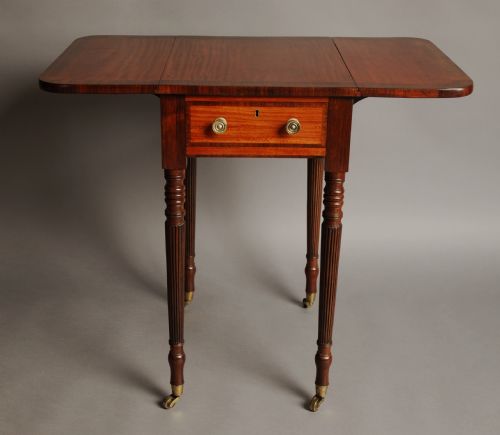fig 2. Early 19th century satinwood drop leaf table of small proportions