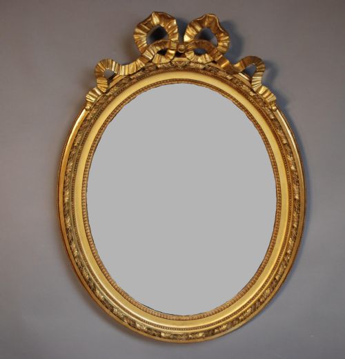 Late 19th Century Large Gilt Wood Oval Wall Mirror of Fine Quality.