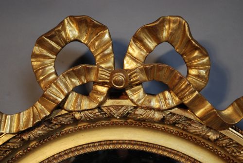 fig 1. Late 19th century large gilt wood oval wall mirror of fine quality.