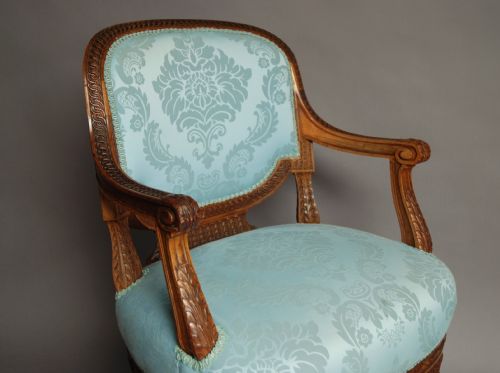 fig 1. Late 19thc French walnut open armchair of excellent quality in blue silk upholstery.