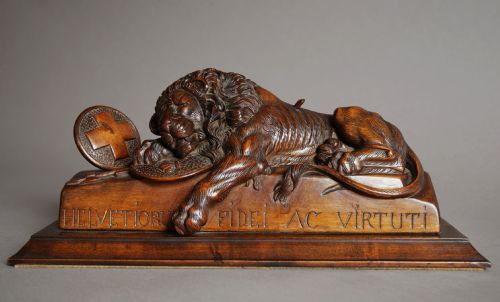 A Black Forest Linden Wood Carving of a Lion, Depicting the Lion of Luzern. 
