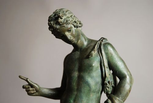 fig 1. Bronze figure of Narcissus with green patination