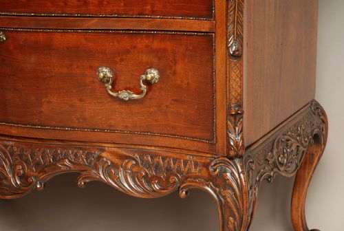 fig 3. Early 20th century mahogany Chippendale revival commode of serpentine form