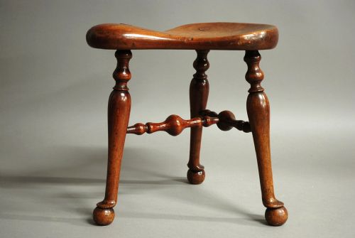 fig 1. Late 19th century walnut saddle seat stool