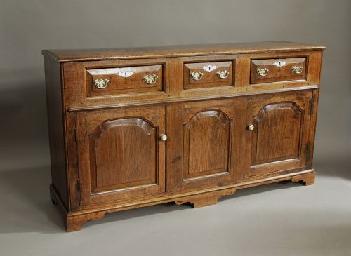 fig 1. 18th century oak cupboard dresser base of superb patina from the North Wales area