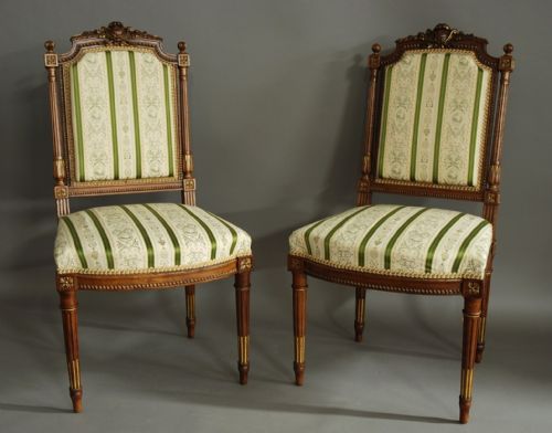 Pair of French Carved Walnut & Parcel-gilt Chairs in the Louis XVI Style