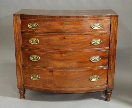 fig 1. Early 19th century mahogany bow front chest of drawers