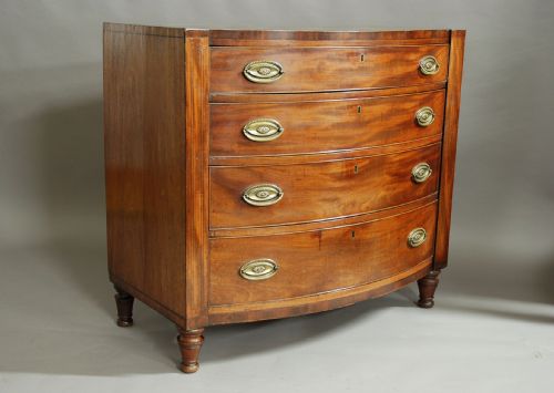 fig 2. Early 19th century mahogany bow front chest of drawers