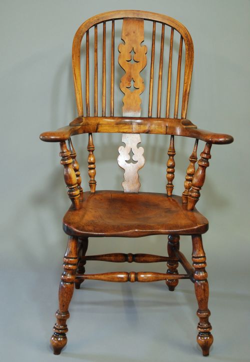 fig 1. Mid 19th century broad armed fruitwood high back Windsor chair