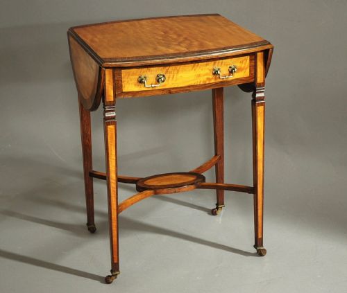 fig 1. Edwardian satinwood & rosewood oval pembroke table