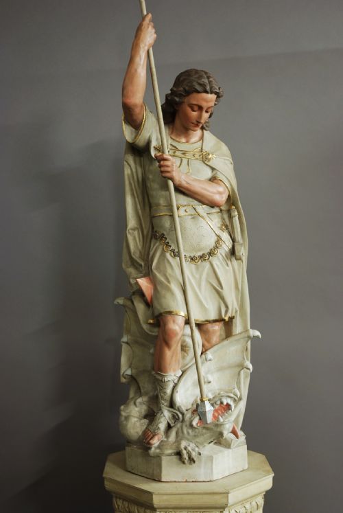 fig 2. Highly decorative large Continental polychrome terracotta figure of St Michael & the Dragon
