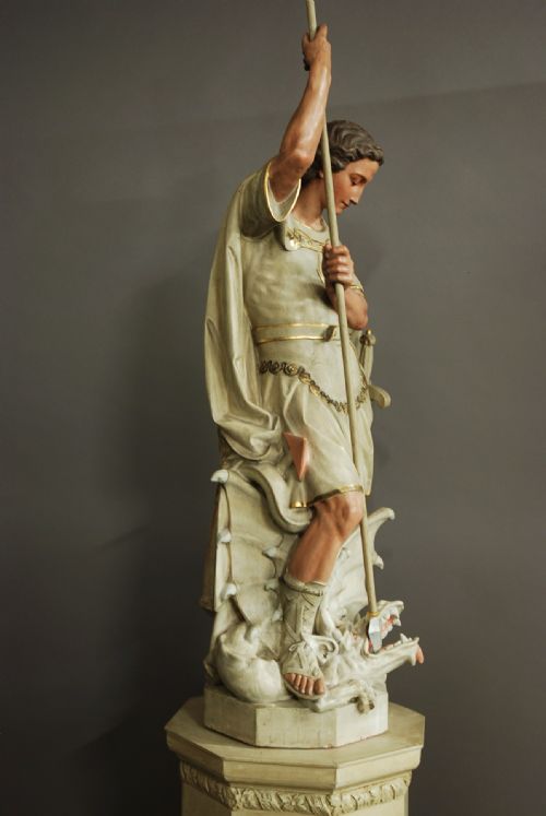 fig 3. Highly decorative large Continental polychrome terracotta figure of St Michael & the Dragon
