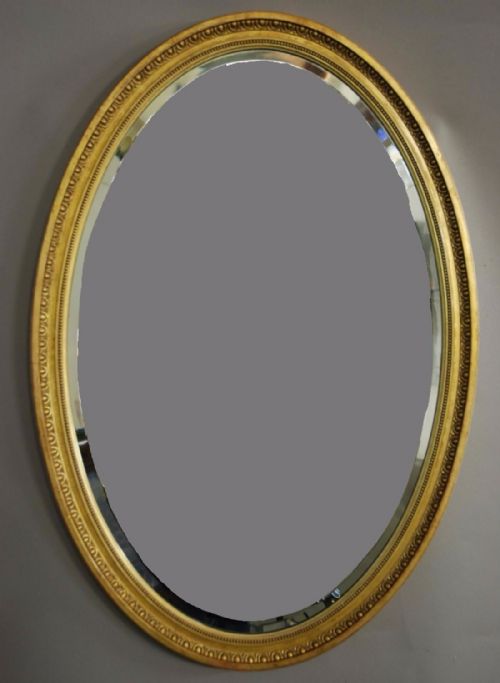 Early 20th Century Oval Giltwood Mirror