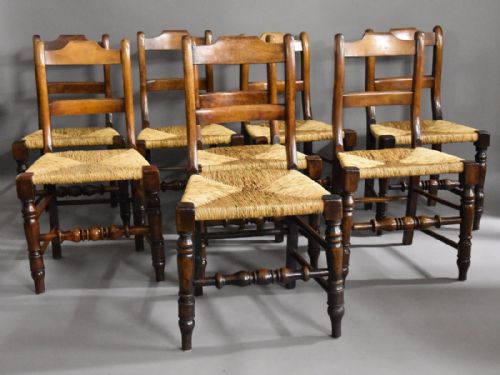 fig 1. Set of eight 19th century alder dining chairs of good patina