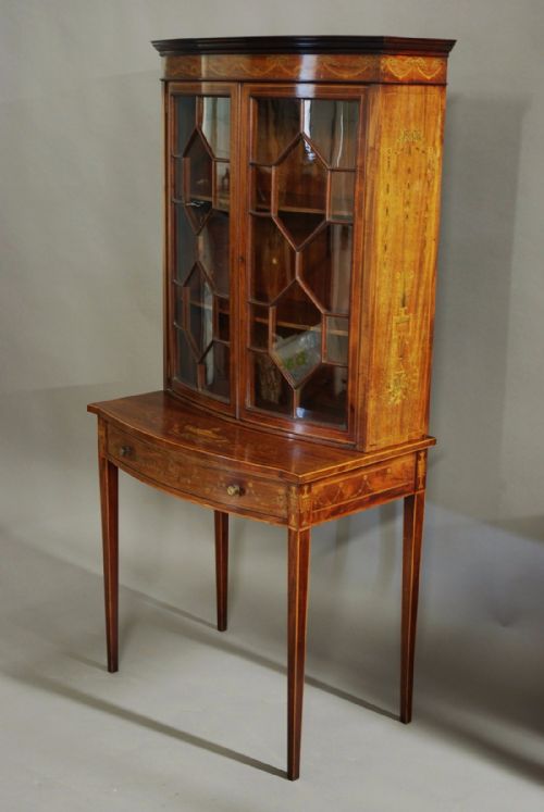 fig 3. Edwardian inlaid mahogany bow front glazed display cabinet