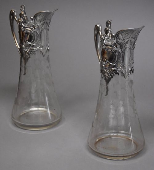 fig 1. Pair of late 19thc silver plate mounted Art Nouveau claret jugs, stamped WMF
