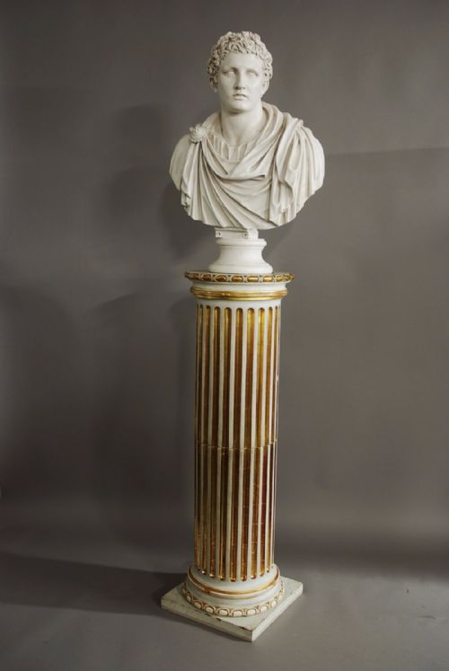 fig 1. Highly decorative carved wooden cylindrical column in the Classical style