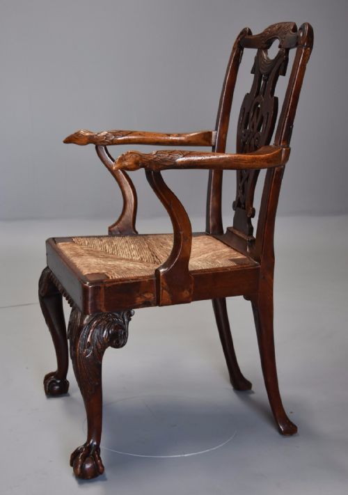 fig 4. 18th century mahogany and walnut armchair of sophisticated design and excellent patina