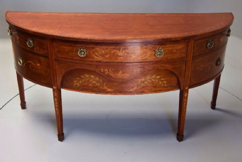 fig 1. Fine quality Edwardian mahogany bow front sideboard with inlaid decoration by Druce & Co