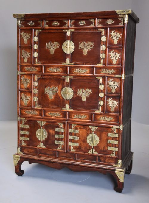 fig 1. Highly decorative 19th century three tier Korean elm cabinet with brass decoration 