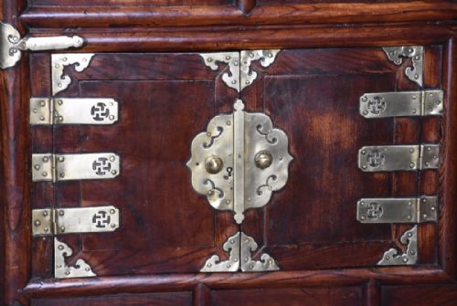 fig 3. Highly decorative 19th century three tier Korean elm cabinet with brass decoration 