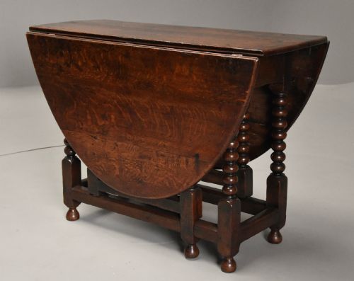 fig 1. 17th century oval oak gateleg table with single gate & bobbin turned legs and super patina
