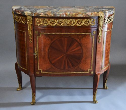fig 1. Superb quality early 20thc French Kingwood commode (or cabinet) of bow form with finely figured marble top