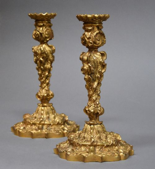 fig 1. Pair of late 19th century French highly decorative ormolu candlesticks in the Rococo style