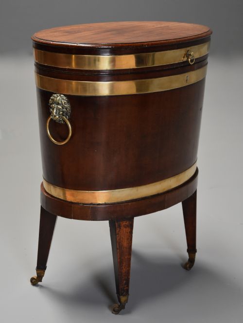 fig 1. Late 18th century mahogany & brass bound oval cellaret of slender proportion