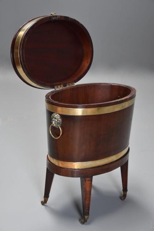fig 2. Late 18th century mahogany & brass bound oval cellaret of slender proportion