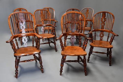 fig 1. Superb rare set of eight 19th century burr yew broad arm high back Windsor armchairs of superb patina