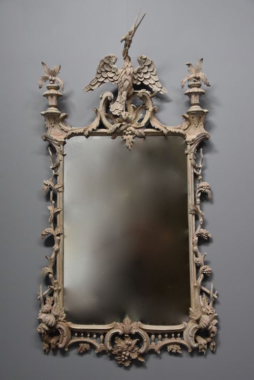 fig 1. A pair of highly decorative Chippendale style painted carved wooden pier mirrors