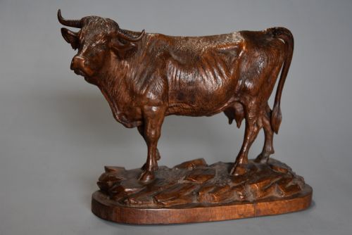 fig 1. Finely carved late 19thc linden wood Black Forest cow, possibly by The Huggler family