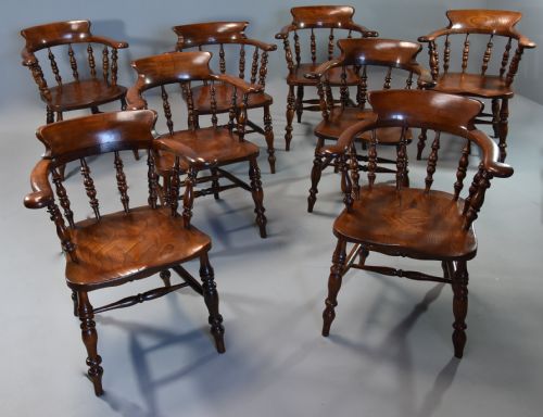 Large Set of Eight Mid 19th Century Smokers Bow Windsor Chairs or Office Chairs.